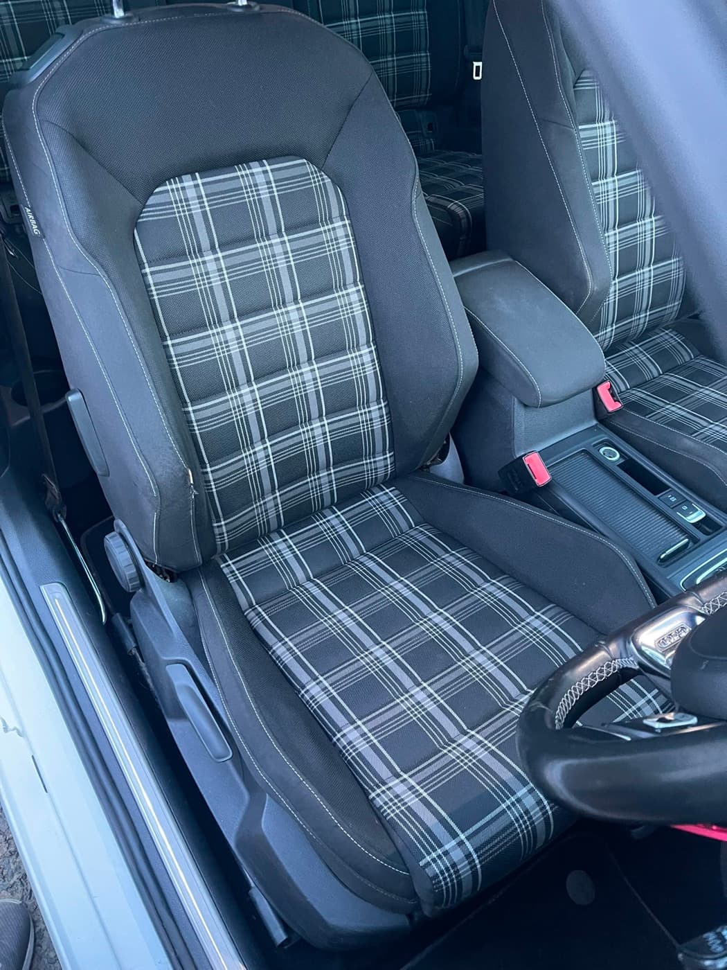 Freshly deep-cleaned tartan car interior