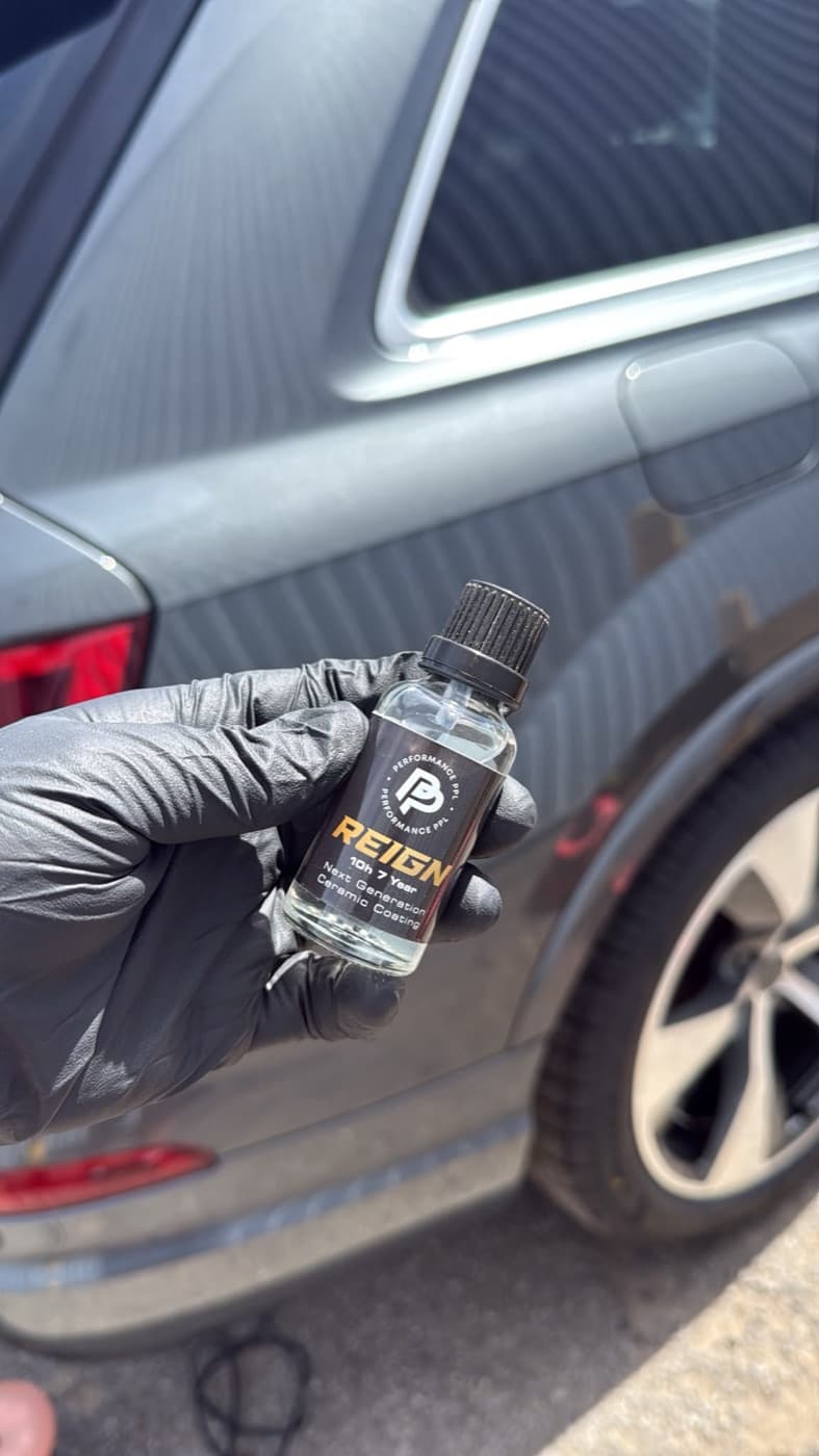 Ceramic coating being applied during a detail